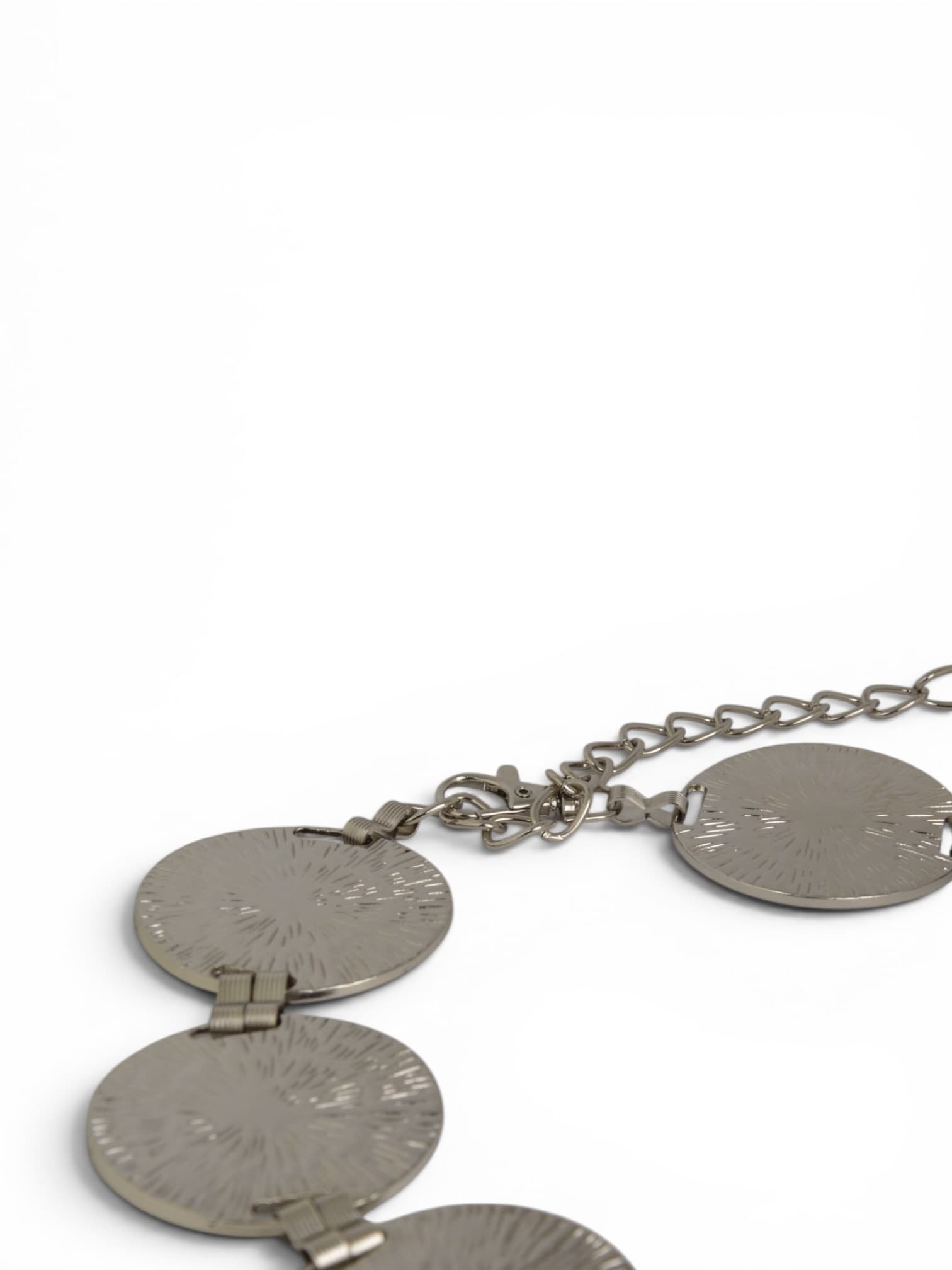 A belt with silver wheels